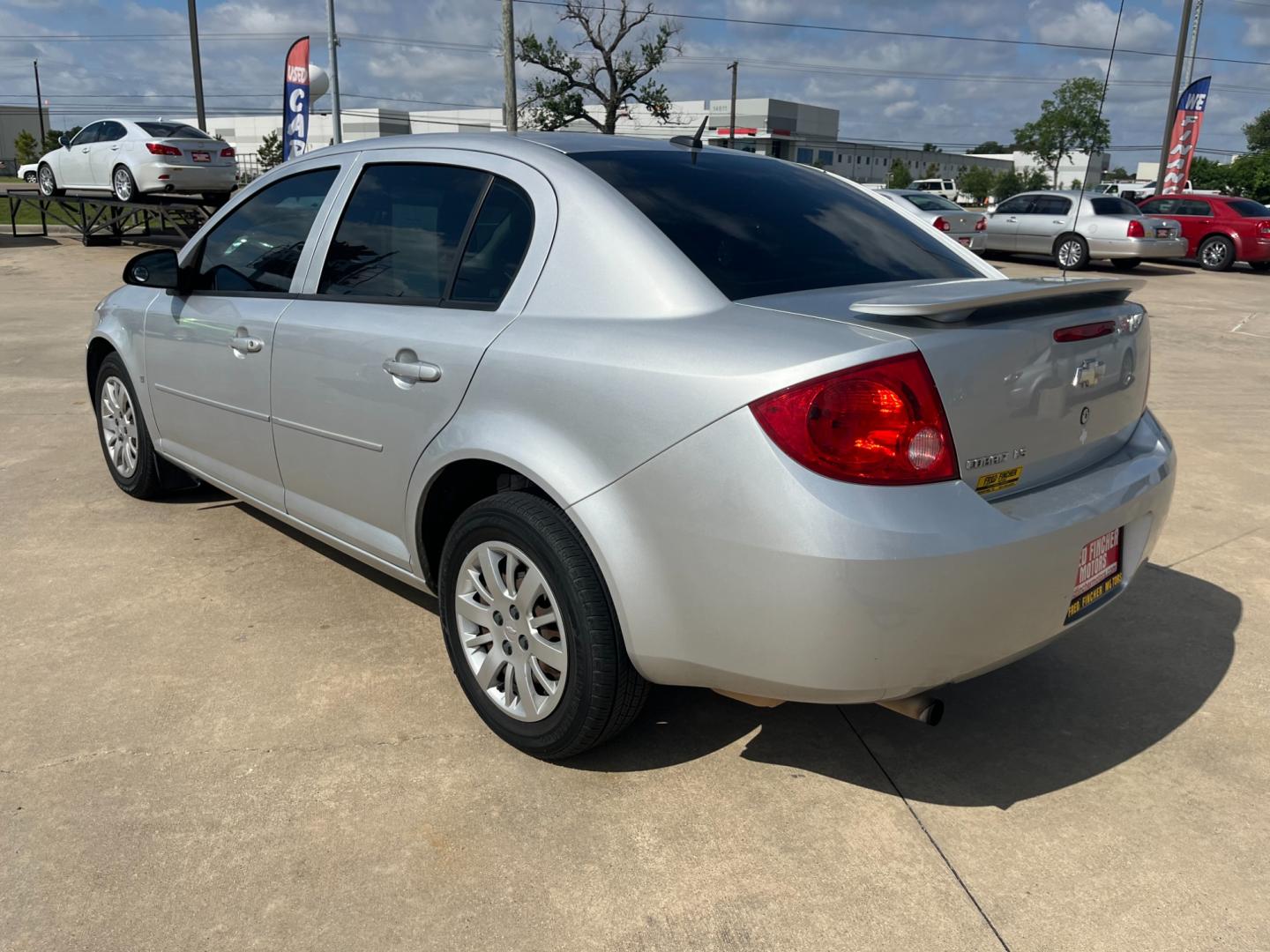 2009 SILVER /black Chevrolet Cobalt LS Sedan (1G1AS58H697) with an 2.2L L4 DOHC 16V engine, 4-Speed Automatic Overdrive transmission, located at 14700 Tomball Parkway 249, Houston, TX, 77086, (281) 444-2200, 29.928619, -95.504074 - Photo#4